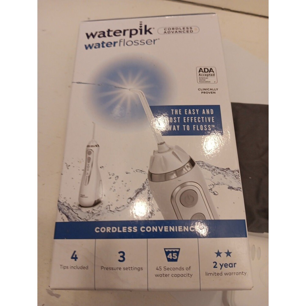 Waterpik WP-560 Cordless Advanced Water Flosser New in Opened Box 4 Tips 3 speed
